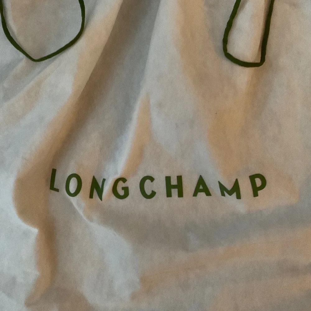 LONGCHAMP DUST BAG.   25” W X 19” H.  White & Green. - Picture 2 of 5